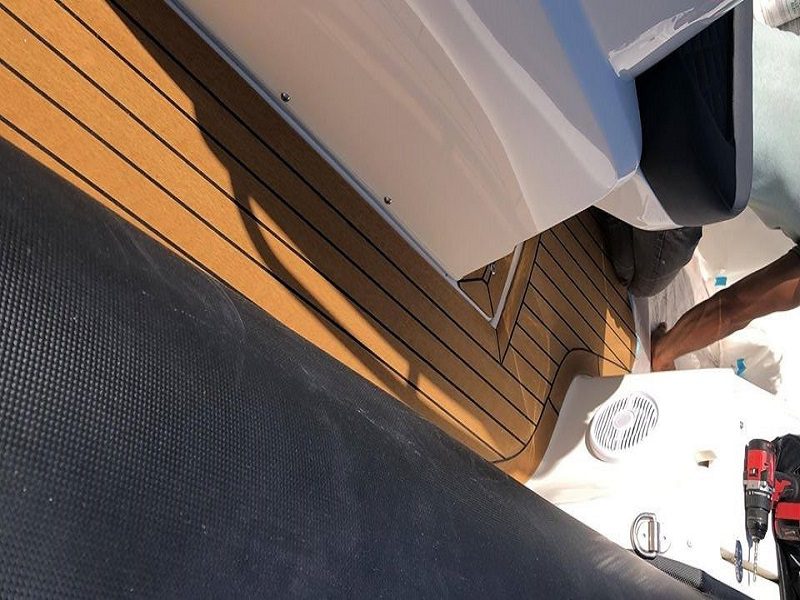 Steel boat with composite cork deck